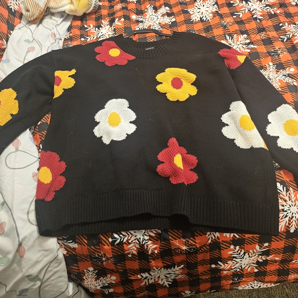 Torrid Black Sweater with Vibrant Floral Accents